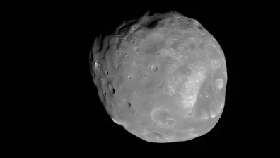 Image du satellite naturel de Mars Phobos capturée lors de la mission Mars Reconnaissance Orbiter de la NASA, placée en orbite en 2006.  Image du satellite naturel de Mars Phobos capturée lors de la mission Mars Reconnaissance Orbiter de la NASA, placée en orbite en 2006.